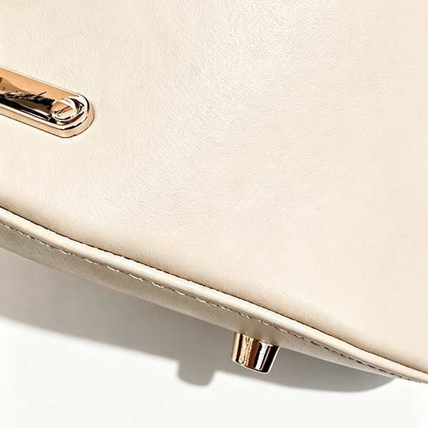 Base studs and stitching detail on beige Mt. Fuji Goen Bag at Grandmama Store in Hong Kong