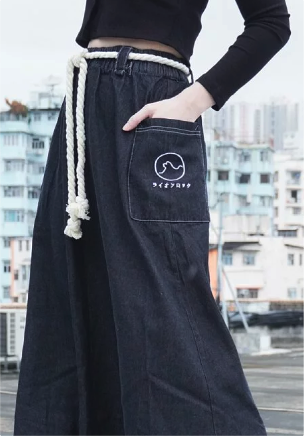 Close-up of Black Lion Rock Kamon Denim Dress with rope belt at Grandmama Store in Hong Kong