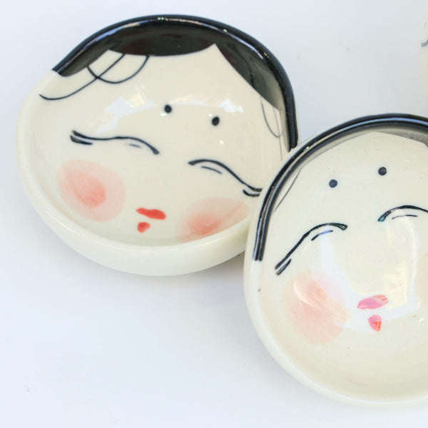 Close-up of Japanese-Style Doll sake cups at Grandmama Store in Hong Kong