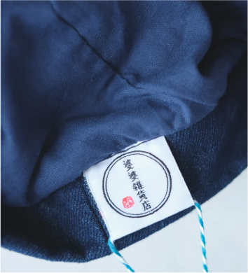 Close-up of Sunshine Beret interior lining and Grandmama Store brand label in Hong Kong