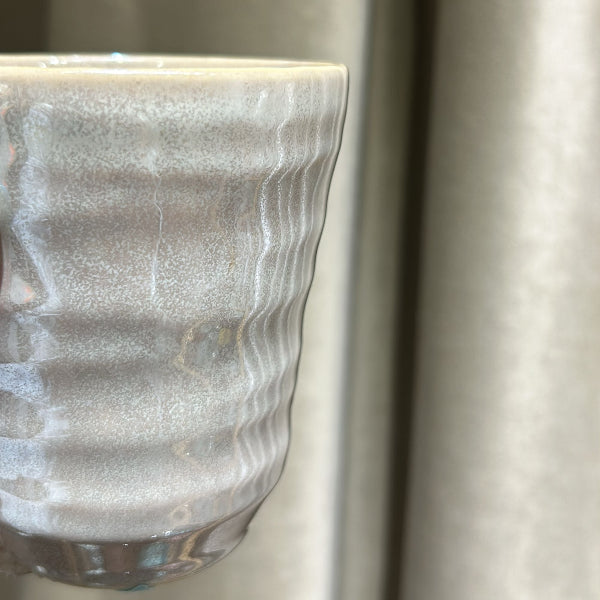 Close-up texture of Pearlescent Ceramic Cup glaze at Grandmama Store in Hong Kong