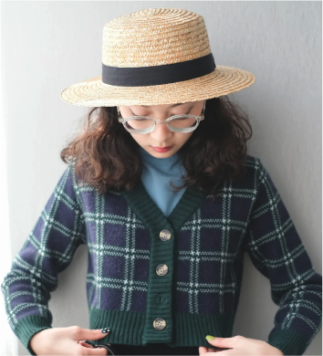 Front view of model wearing French Straw Boater Hat at Grandmama Store in Hong Kong