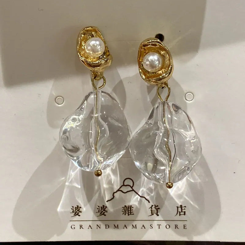 Gold pearl studs with clear resin drop earrings at Grandmama Store in Hong Kong