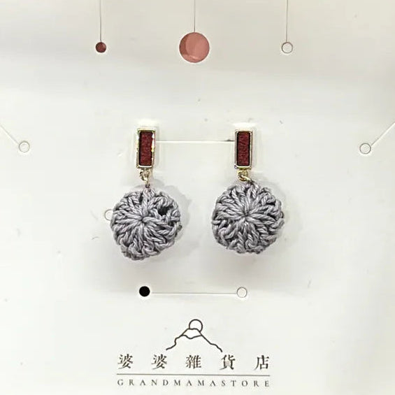 Grey crochet drop earrings with red enamel studs at Grandmama Store in Hong Kong