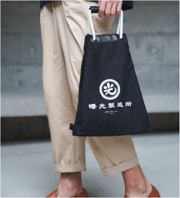Light of Dawn Sake Bag Black Denim handheld tote style photo at Grandmama Store in Hong Kong.