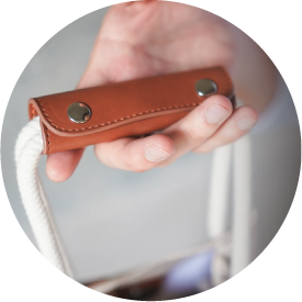 Light of Dawn Sake Bag leather handle grip close-up photo at Grandmama Store in Hong Kong.