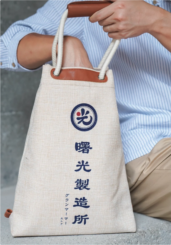 Light of Dawn Sake Bag linen in-use lifestyle photo at Grandmama Store in Hong Kong.