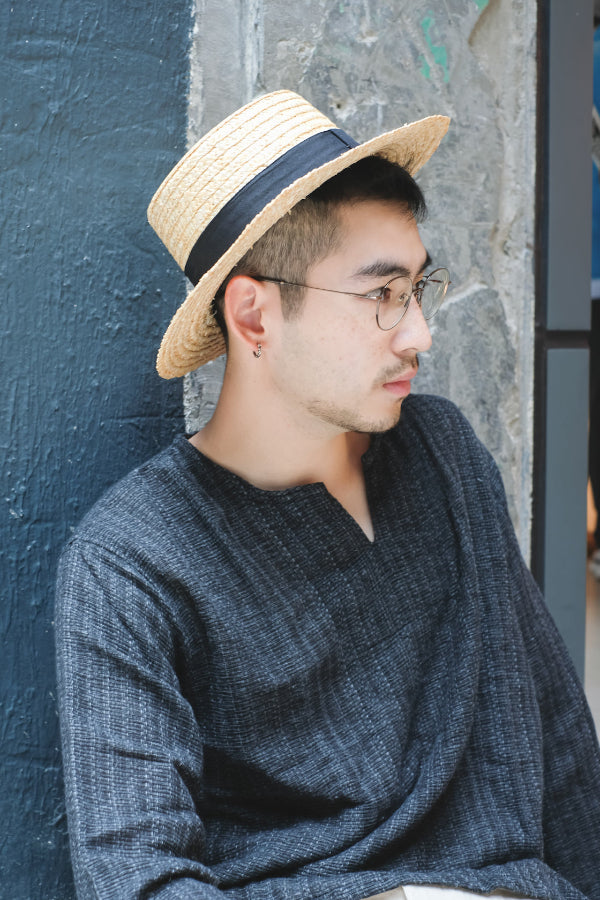 Male model wearing French Straw Boater Hat at Grandmama Store in Hong Kong