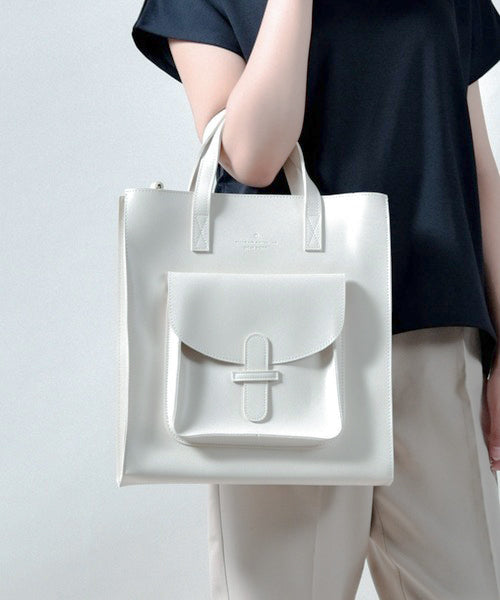 Model Front View holding off-white Vintage Soft Leather Convertible Bag at Grandmama Store in Hong Kong