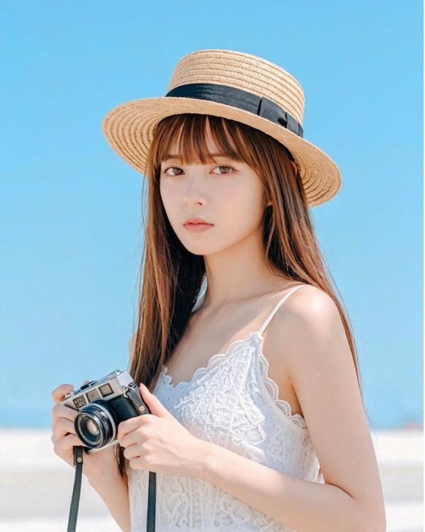 Model holding vintage camera wearing French Straw Boater Hat at Grandmama Store in Hong Kong