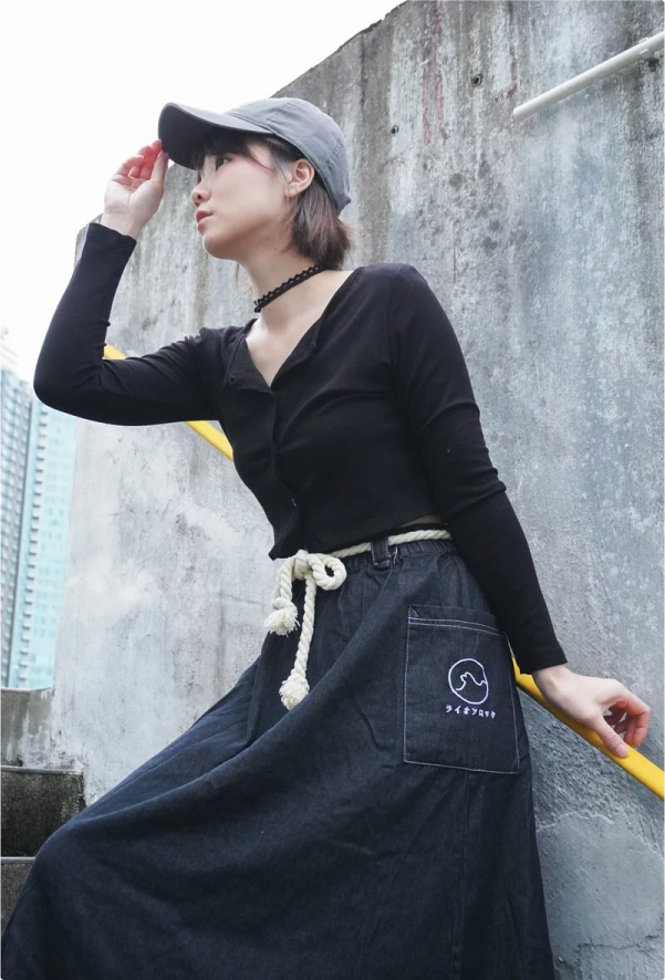 Model wearing Black Lion Rock Kamon Denim Dress with rope belt at Grandmama Store in Hong Kong