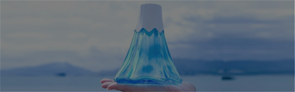 Mount Fuji blue glass water bottle with white cap at Grandmama Store in Hong Kong.