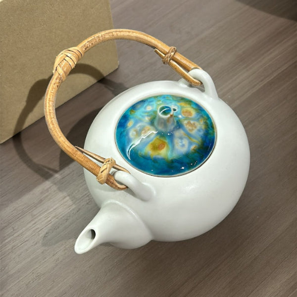Top view of Marbled clay teapot with blue marbled lid at Grandmama Store in Hong Kong