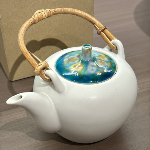White Marbled clay teapot with turquoise lid side view at Grandmama Store in Hong Kong